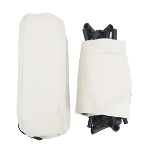 Portable folding camping chair packed in storage bag, compact design for outdoor picnic and fishing.