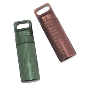 Waterproof aluminum pill bottle EDC container detail view showing textured grip design and dual colors.