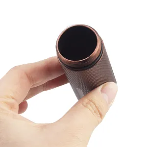 Aluminum alloy outdoor EDC waterproof capsule container for pills and survival gear storage.
