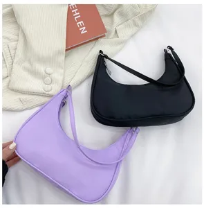 Chic crescent shoulder bag for women, versatile underarm handbag and stylish daily purse.