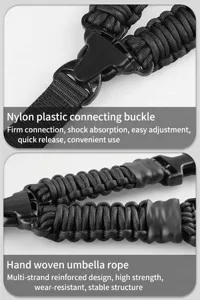 Tactical paracord gun sling strap detail showing woven umbrella rope and nylon buckle.