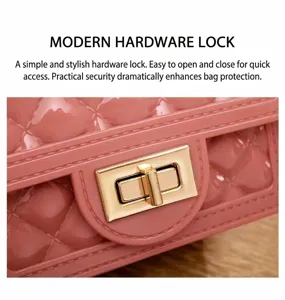 Detailed view of pink quilted jelly bag with gold turn-lock closure, stylish and secure.