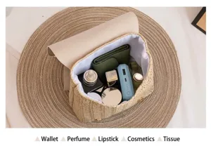 Detailed top view of straw backpack interior capacity showing neat storage of daily essentials.