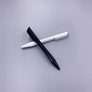 Close-up detail of black and white triangular twist ballpoint pens, matte texture.