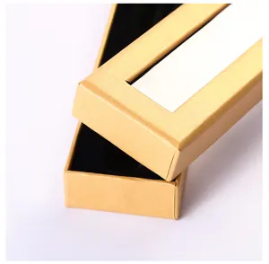 Caja de papel dorado para bolígrafo detalle, envase regalo lujo con inserto terciopelo.