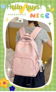 Pink star print casual student backpack, multi-layer large capacity school bag for use.