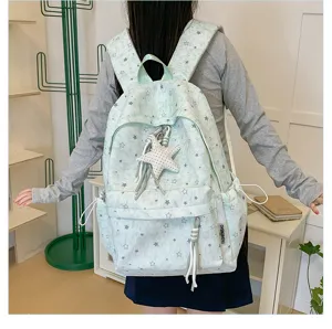Cute star pattern backpack for women, large capacity casual school bag for daily travel.