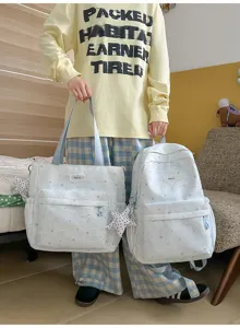 Detailed close-up view of the Korean style starry sky blue canvas backpack and tote bag set.