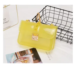 Clear yellow PVC shoulder crossbody jelly bag featuring chic gold hardware and stylish studded flap.