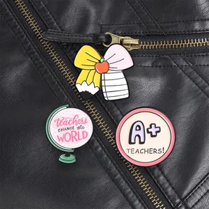 Teacher theme metal lapel pins detail showing cute globe, bow pencil and A+ badge designs.