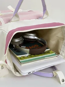 Casual large capacity student backpack with open compartment showing spacious interior design.