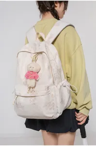 Süßer ästhetischer Bären-Leinwand-Rucksack mit Plüsch-Anhänger für Schule und Alltag.