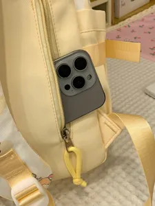Light yellow canvas casual school backpack for students, daily travel lightweight daypack.