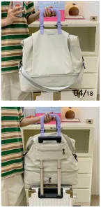 Large capacity travel duffel bag with waterproof fabric and luggage sleeve for gym business