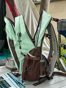 Outdoor hiking backpack with multi-compartments, lightweight and breathable design for travel.
