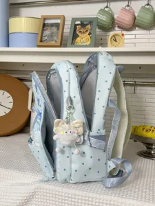 Bonita mochila escolar azul claro con diseño de estrellas, gran capacidad para estudiantes.