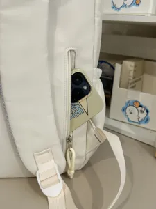 Sac à dos décontracté unicolore léger sac d'école de voyage avec poche latérale zippée