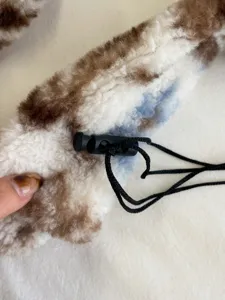 Autumn winter fluffy plush crossbody bag cozy shearling shoulder bag with drawstring detail.