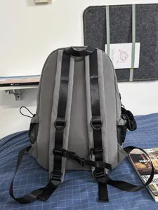 Grey functional sports backpack for outdoor travel, camping, and daily casual commuting use.