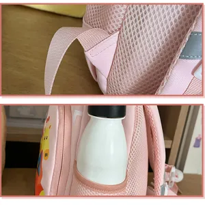 Cute pink toddler backpack detail showing breathable mesh shoulder straps and handy side water bottle pocket.