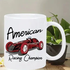 Detailed shot of a white ceramic coffee mug featuring a vintage red race car graphic design.