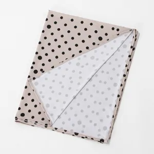 Minimalist polka dot soft hijab scarf for women, stylish draped shawl and head cover accessory.