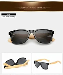 Detailed close-up of black frame sunglasses with natural wooden bamboo temples and grey lenses.