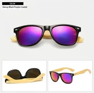Close-up detail view of classic sunglasses with black frame, colorful lenses and bamboo legs.