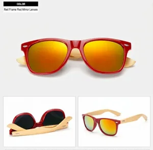Detail view of red frame sunglasses with colorful mirror lenses and natural bamboo temples.