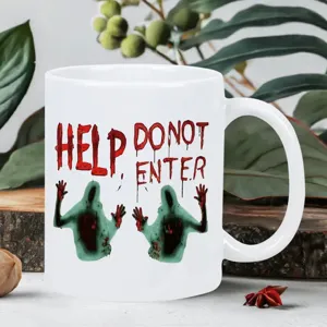 Witte keramische koffiemok met horror zombie handafdruk design, ideaal voor kantoor.
