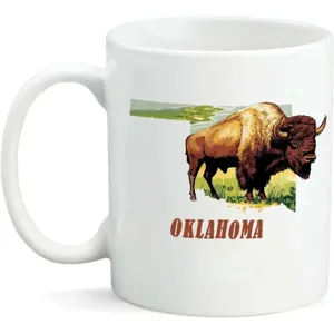 Vista detallada de la taza de cerámica blanca que muestra el diseño gráfico del bisonte.