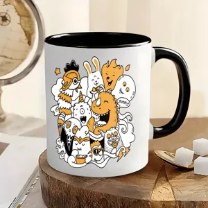 Κούπα κεραμική με σχέδιο τέρας doodle και μαύρη λαβή, ιδανική για το γραφείο και χρήση.