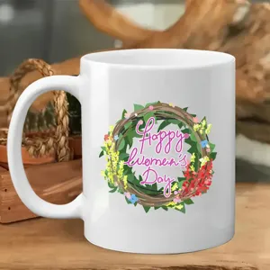 White ceramic coffee mug with holiday floral wreath print, perfect for office and daily use.