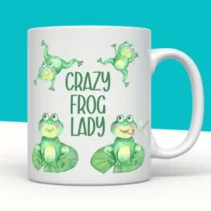 White ceramic coffee mug with cute watercolor frog design, perfect for office and daily use.