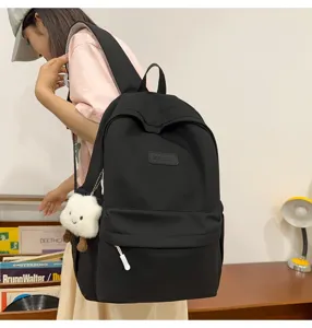 Casual black minimalist large capacity school backpack with cute cloud pendant for daily use.
