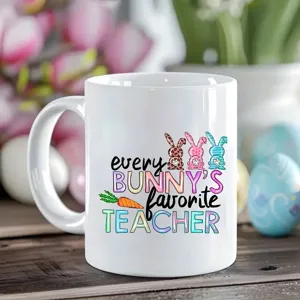 Taza de cafe de ceramica blanca con lindo diseño de conejo de Pascua para oficina.