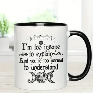 Tasse à café en céramique avec citation drôle, poignée et intérieur noirs, design phases de lune.