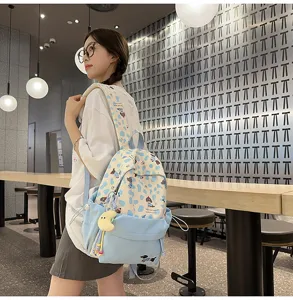 Süßer japanischer Studentenrucksack mit niedlichem Hundemuster, hellblaue Freizeittasche für den Alltag.