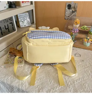Cute cartoon yellow and blue plaid school bag, sweet style fashion casual double shoulder backpack.