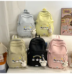 Vista detallada de mochila estilo universitario japonés dulce, bolso grande con compartimentos.