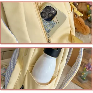 Canvas school backpack with plaid straps, cute yellow travel daypack for student girls.