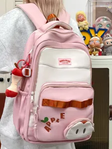 Mochila grande rosa y blanca para estudiantes y uso diario, bolso escolar vista principal.