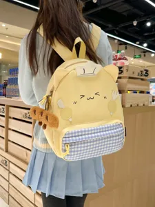 Cute cartoon cat backpack for girls, fashionable Japanese style school bag with plush pendant.