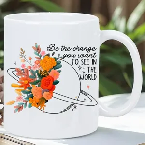 Tazza da caffè in ceramica bianca con design floreale e planetario, ideale in ufficio.