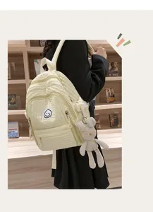 Cute girls school backpack with smiley patch and rabbit pendant, sweet style casual daypack.