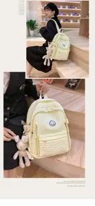 Sweet girl school backpack with cute smiley patch and bunny pendant, stylish casual daily bag.