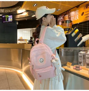 Pink quilted sweet girl backpack for school and daily casual wear with cute bunny pendant.