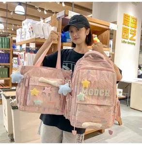 Pink casual backpack and tote bag set with cute star charms and stylish design for daily use.