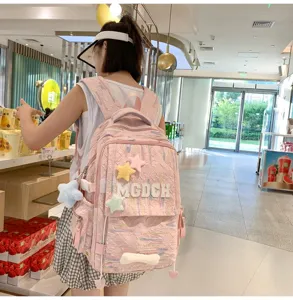 Japanese ins-style casual pink backpack with cute star patches for daily school and travel use.