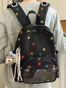 Mochila bonita de lunares para mujeres y niñas, bolsa escolar casual con bolsillo frontal.